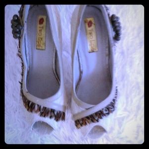 Off white peep toe w feathered and bead detail